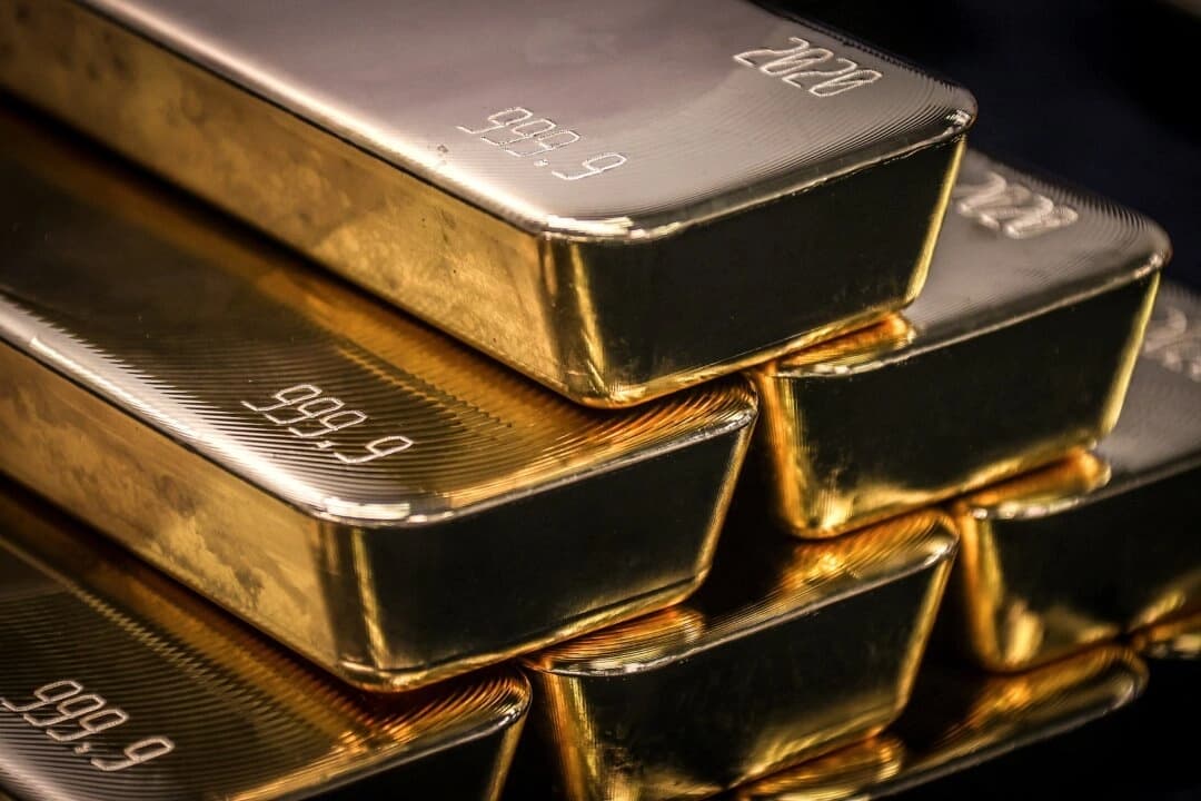 Lingotes de oro fotografiados tras ser inspeccionados y pulidos en la refinería ABC de Sídney (Australia), el 5 de agosto de 2020. (David Gray/AFP vía Getty Images)
