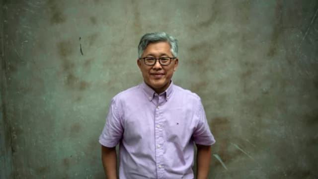 Jin Mingri, pastor principal de la Iglesia Sión, posa en Beijing el 12 de septiembre de 2018. (Fred Dufour/AFP vía Getty Images)