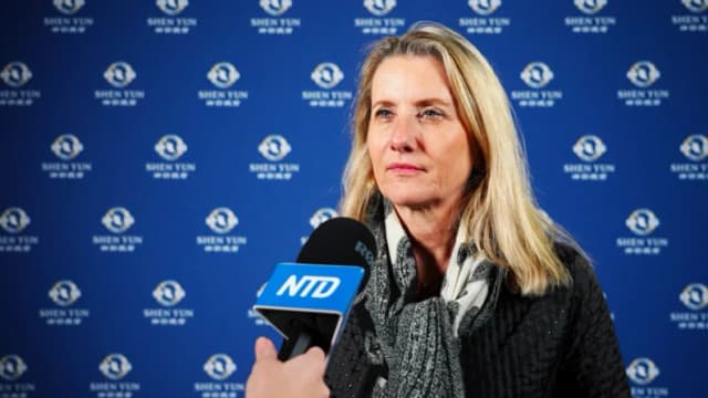 Martine Grigis, médica y directora de unidad en las Naciones Unidas, disfrutó de Shen Yun en el Geneva Arena el 20 de enero de 2026. NTD