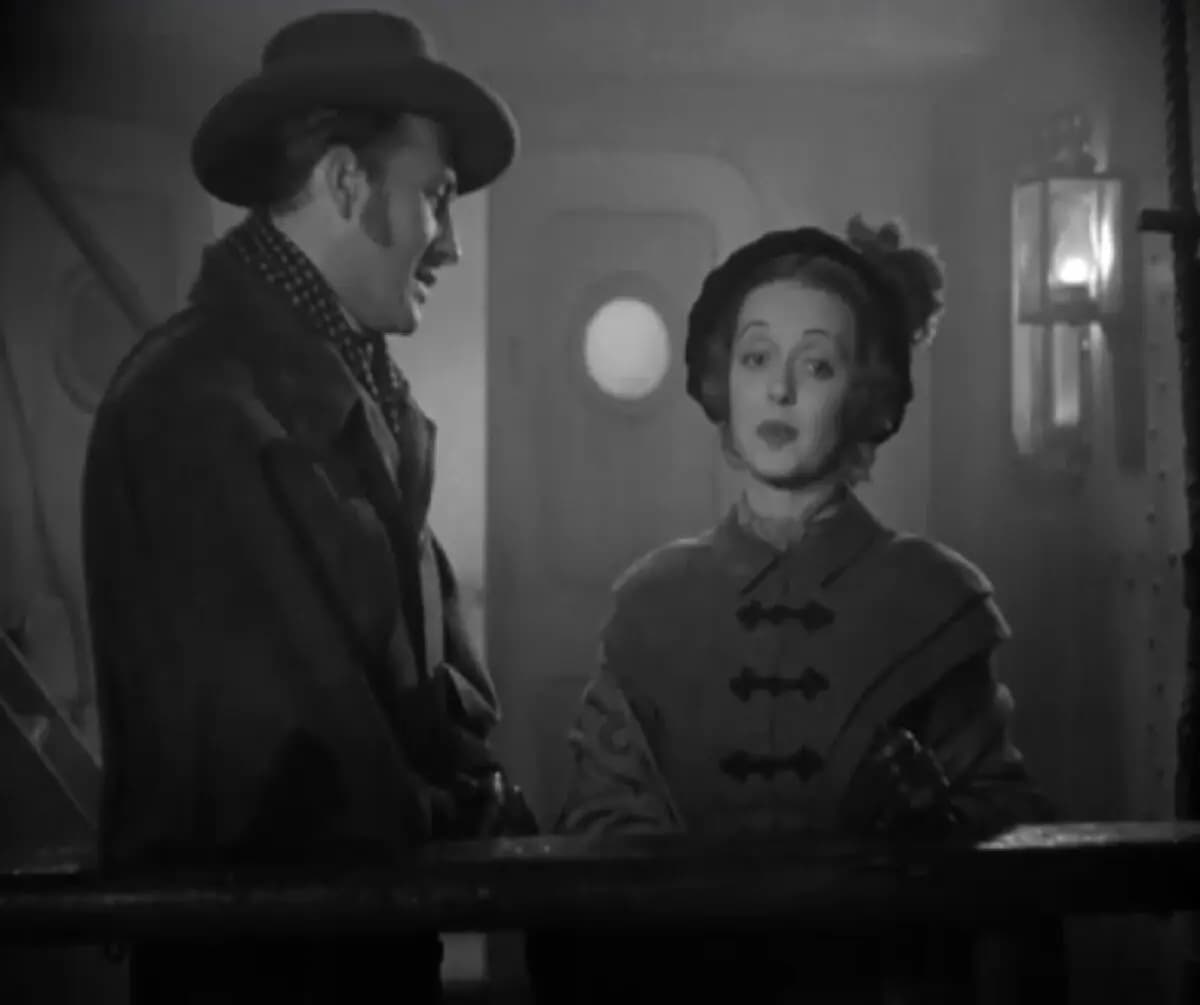 Henry Martyn Field (Jeffrey Lynn) y Henriette Deluzy-Desportes (Bette Davis), en "Todo esto y el cielo también". Warner Bros. Pictures
