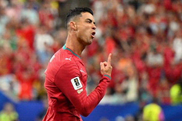 El jugador portugués Cristiano Ronaldo celebra el 1-0 durante el partido del Mundial en Houston, USA. . (EFE/EPA/SAM WASSON)