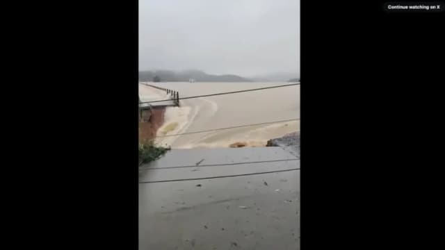 "¿Cómo no íbamos a inundarnos?": Puerto chino en Guangxi inundado por presa rota y fuga de cobras