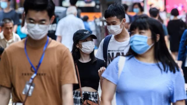 Pico de contagio de COVID-19 en el sur de China en medio de un repunte a nivel nacional