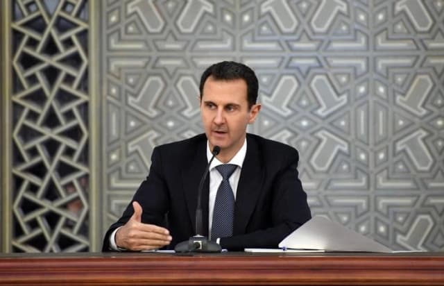 El entonces presidente sirio Bashar al-Assad en Damasco, Siria, el 14 de noviembre de 2017. (SANA/Imagen cortesía de Reuters)