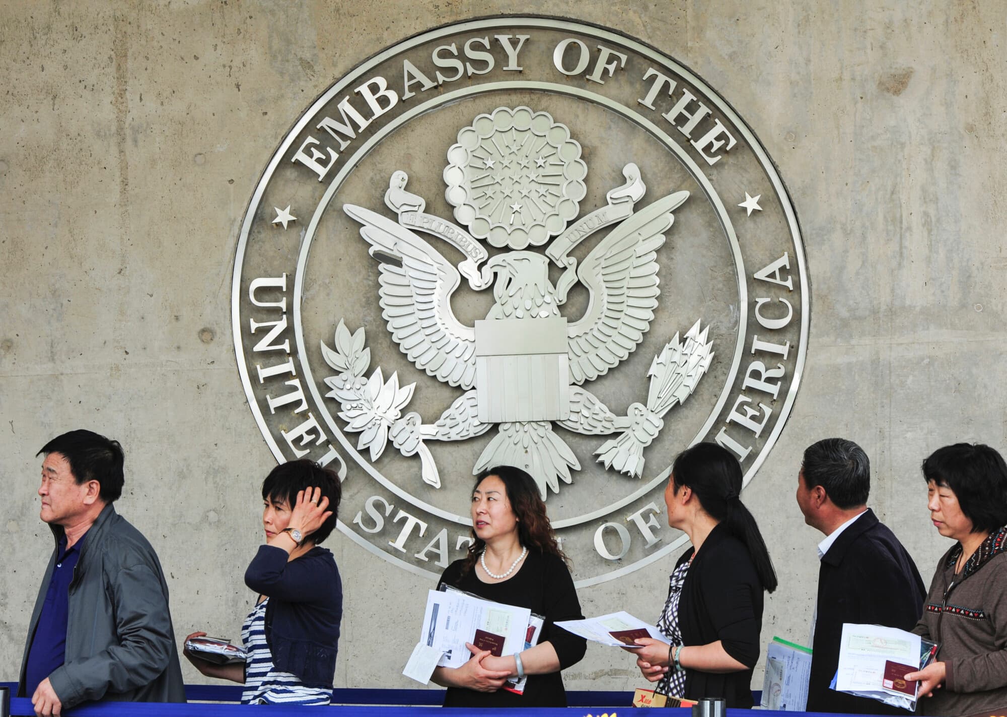 Chinese citizens wait to submit their visa applications at the U.S. Embassy in Beijing on May 2, 2012. (Mark Ralston/AFP/GettyImages)